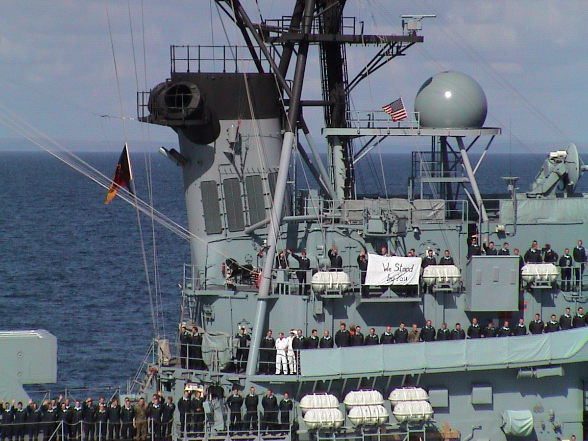 jpeg: German War Ship Lutgens
	      Saluting A US Naval Vessel Following
	      911.